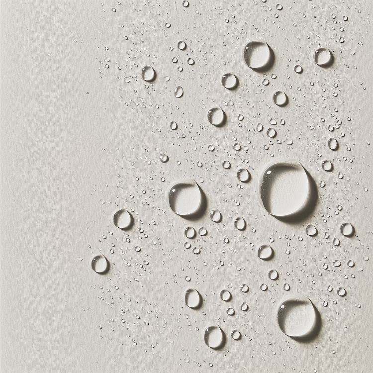 Hydrating droplets on grey background representing REMAKE TeaTox Face Serum Mist, Australian clean vegan skincare