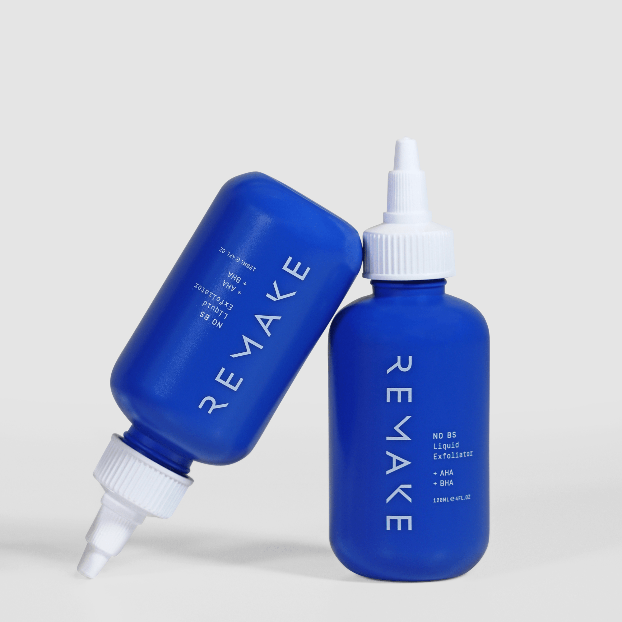 Two REMAKE NO BS Liquid Exfoliator bottles with AHA and BHA acids, natural Australian exfoliating toner for clear skin