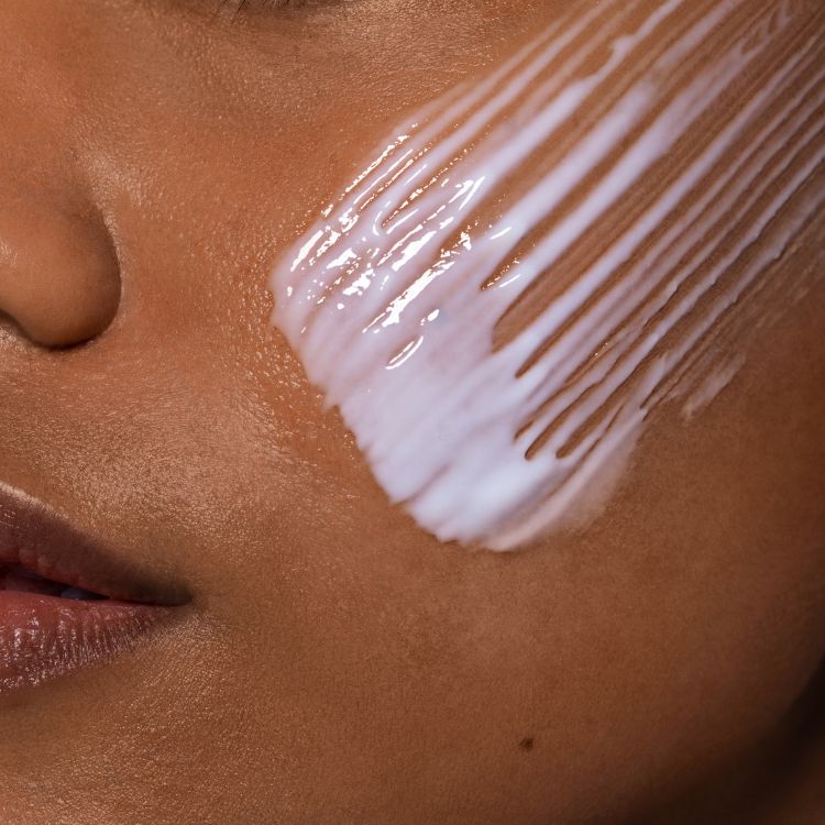 Model with close-up swatch of REMAKE Mycelium Snow Mushroom Mask, sustainable Australian vegan skincare