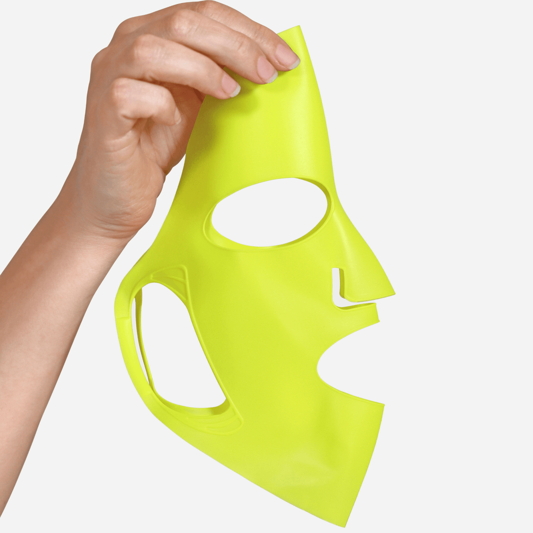Hand holding REMAKE Evergreen Silicone Sheet Mask, reusable sustainable Australian clean beauty skincare